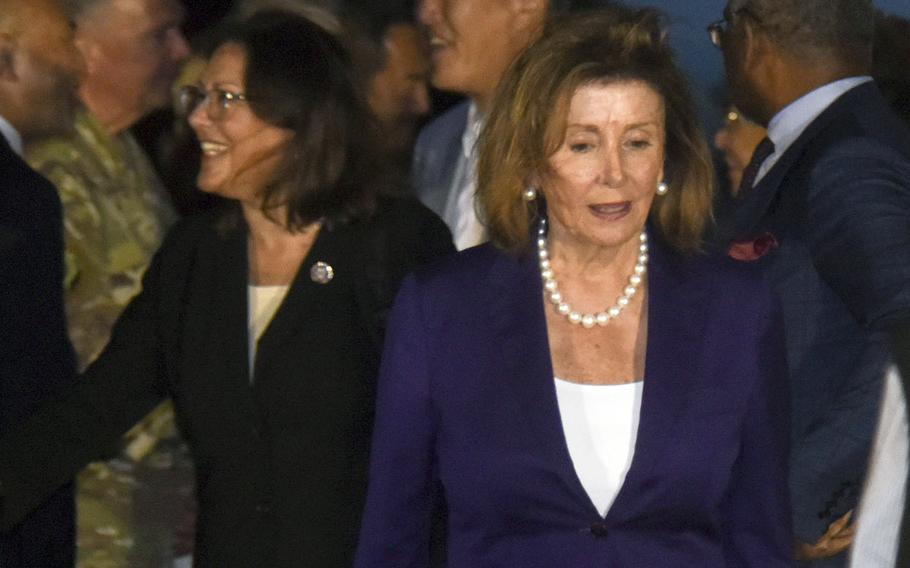 U.S. House Speaker Nancy Pelosi arrives with a congressional delegation at Yokota Air Base, Japan, Thursday, Aug. 4, 2022.