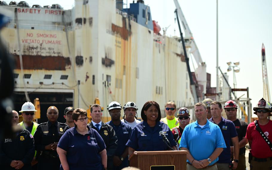 U.S. Coast Guard Capt. Zeita Merchant, the captain of the port and federal on-scene coordinator, addresses the media during a news conference in front of the motor vessel Grande Costa D’Avorio in Port Newark, N.Y., July 11, 2023. 