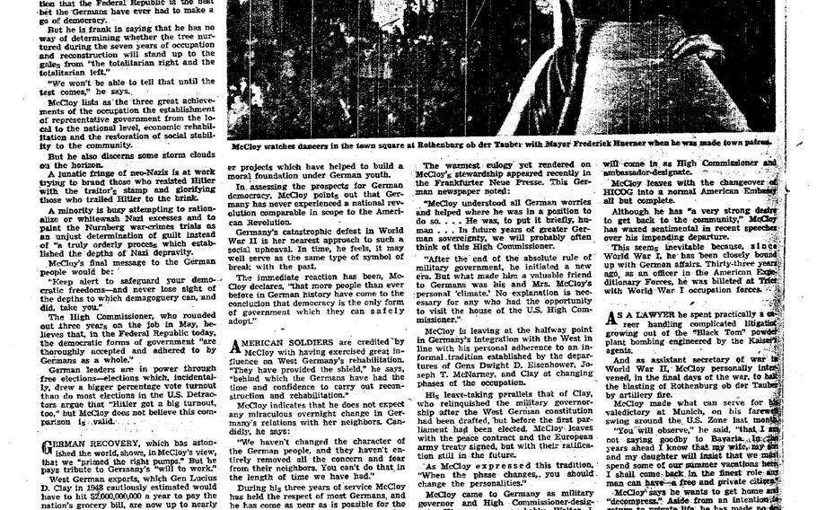 A black and white newspaper page