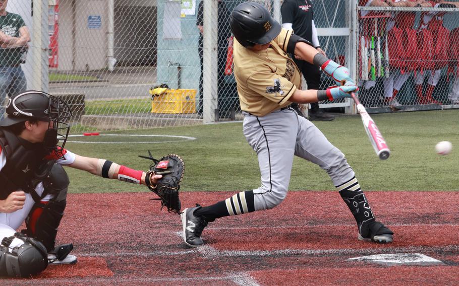 Humphreys' Bradley Miller makes contact against Kinnick during Tuesday's Division I baseball playoff game. The Red Devils won 7-2 and will play for third place Thursday.