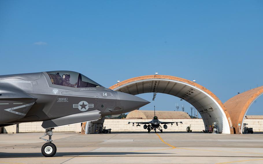 A Marine Corps F-35B Lightning II out of Iwakuni, Japan, taxis by an F-16 Fighting Falcon at Kunsan Air Base, South Korea, Oct. 31, 2022. 