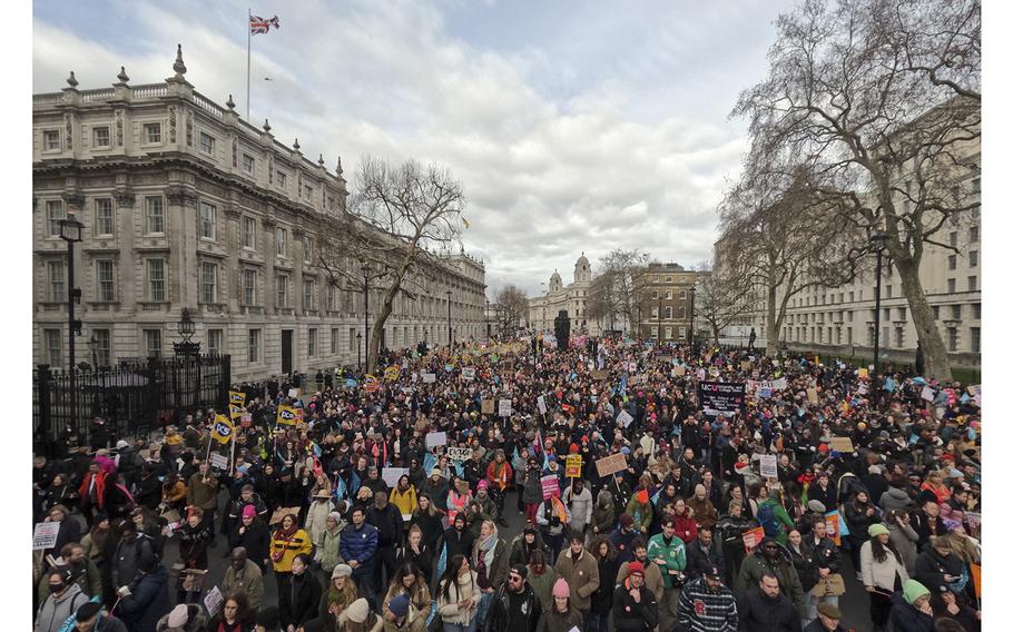 Union members and supporters march along Whitehall during a day of national strikes on Feb. 1, 2023, in London, England. 