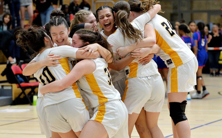 The Stuttgart Panthers celebrate their 33-26 win over Ramstein in the girls Division I final at the DODEA-Europe basketball championships in Wiesbaden, Germany, Feb. 17, 2024. 
