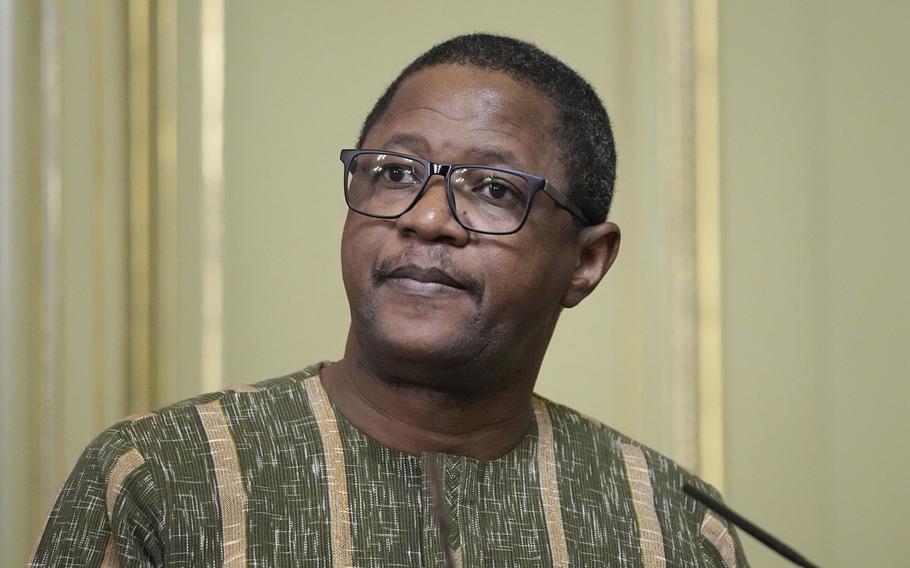 Burkina Faso Foreign Minister Karamoko Jean Marie Traore attends a joint news conference