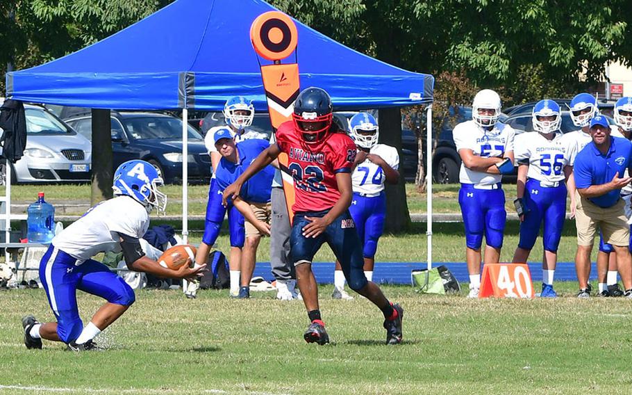 Rota's Jaden Decastro catches a pass during the second quarter of the Admirals' 44-0 loss to Aviano on Saturday, Sept. 23, 2023.