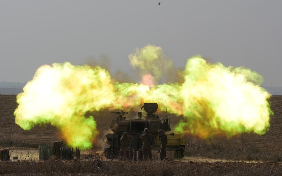 An IDF mobile artillery fires toward Gaza, near the Israeli town of Sderot, in southern Israel, on Wednesday.