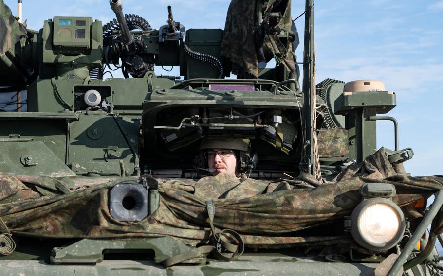 Pfc. Ethan Calender drives an M-SHORAD system at Lest Training Area, Slovakia, Dec. 20, 2023.