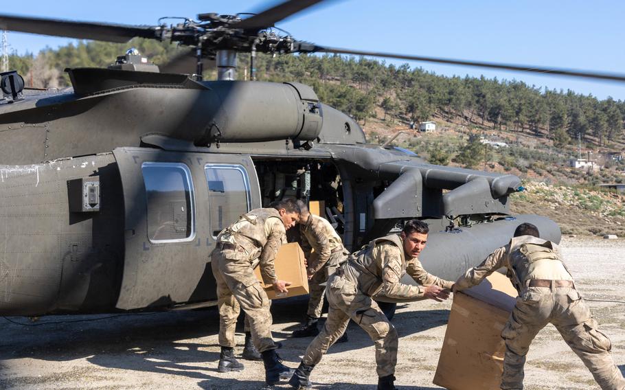 A U.S. Army UH-60M Black Hawk assigned to 1st Armored Division, Combat Aviation Brigade, delivers relief supplies to the Turkish relief authorities in Hassa, Turkey, Feb. 21, 2023.