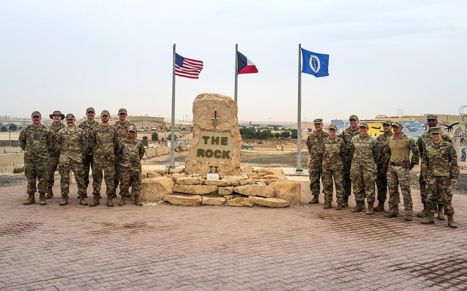 Volunteers with Task Force 99.M, an organization that solicits ideas from airmen for ways to improve the Air Force, gather on Nov. 11, 2022, at Ali Al Salem Air Base in Kuwait.