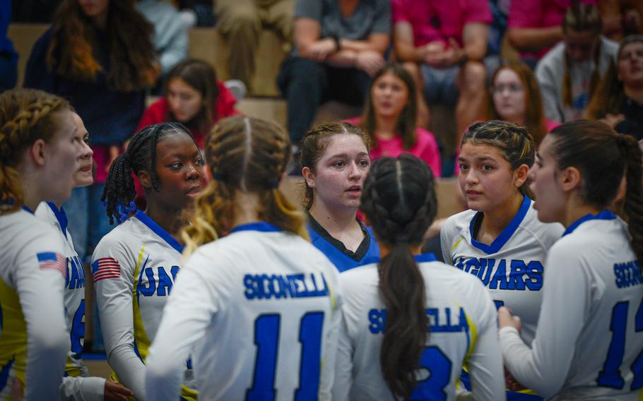 The Sigonella Jaguars talk about their strategy for the next set against Ansbach during the 2022 DODEA-Europe Volleyball Tournament Oct. 29, 2022, at Ramstein Air Base, Germany. 