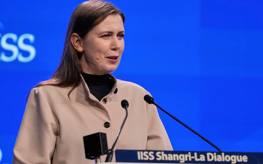 Lithuania’s Defense Minister Dovile Sakaliene delivers a speech.