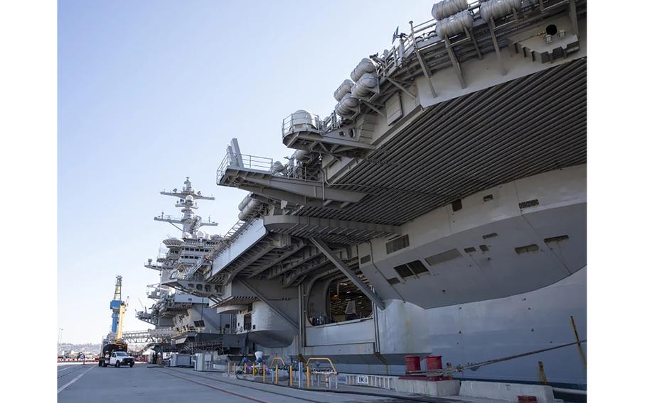Sailors with the aircraft carrier Carl Vinson prepare to deploy from Naval Base Coronado in August 2021. 
