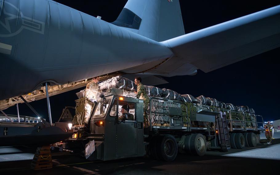 A U.S. Air Force C-130J Super Hercules is loaded with humanitarian aid destined for an airdrop over Gaza at an undisclosed location within the U.S. Central Command area of responsibility, Tuesday, March 5, 2024. 