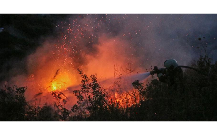 Efforts are made to put out a brush fire in Syria as seen in a July 20, 2023, social medial post.