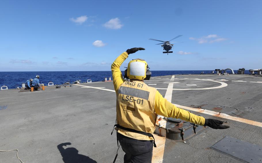 An MH-60S Seahawk lands on the flight deck of the Arleigh Burke-class destroyer USS Ramage on Oct. 19, 2023. The Ramage is part of the USS Gerald R. Ford carrier strike group and is operating in the Eastern Mediterranean Sea.