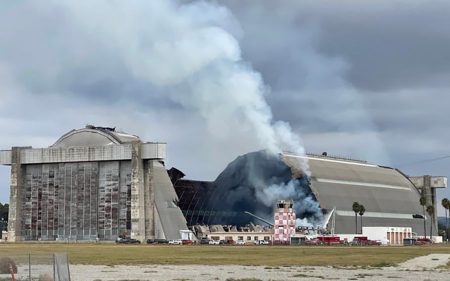 Orange County, Calif., firefighters battle a fire at the historic north hangar at the former Marine Corps Air Station Tustin on Tuesday, Nov. 7, 2023.