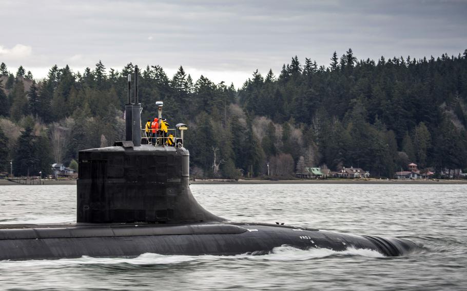 The fast-attack submarine USS Connecticut, seen here departing Puget Sound Naval Shipyard in December 2016, received damage to its ballast tanks and sonar dome after striking an undersea mountain in October 2021.