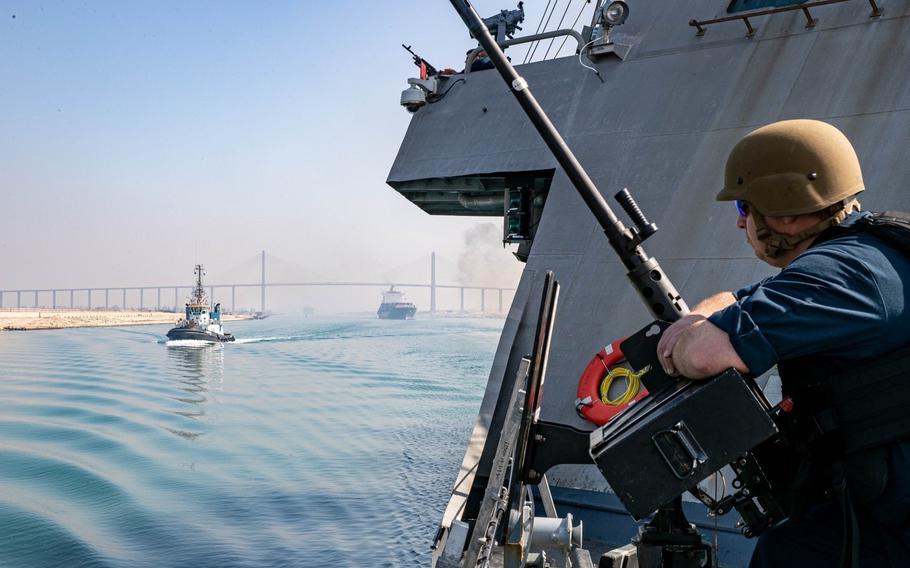 Petty Officer 1st Class Christopher Massengill, assigned to Littoral combat ship USS Sioux City, mans a M2A1, .50-caliber machine gun as the Sioux City transits the Suez Canal, May 29, 2022. Sioux City is deployed to the U.S. 5th Fleet area of operations.