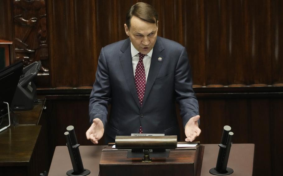 Poland’s Foreign Minister Radek Sikorski delivers a speech to the parliament in Warsaw, Poland, Thursday April 25, 2024. 