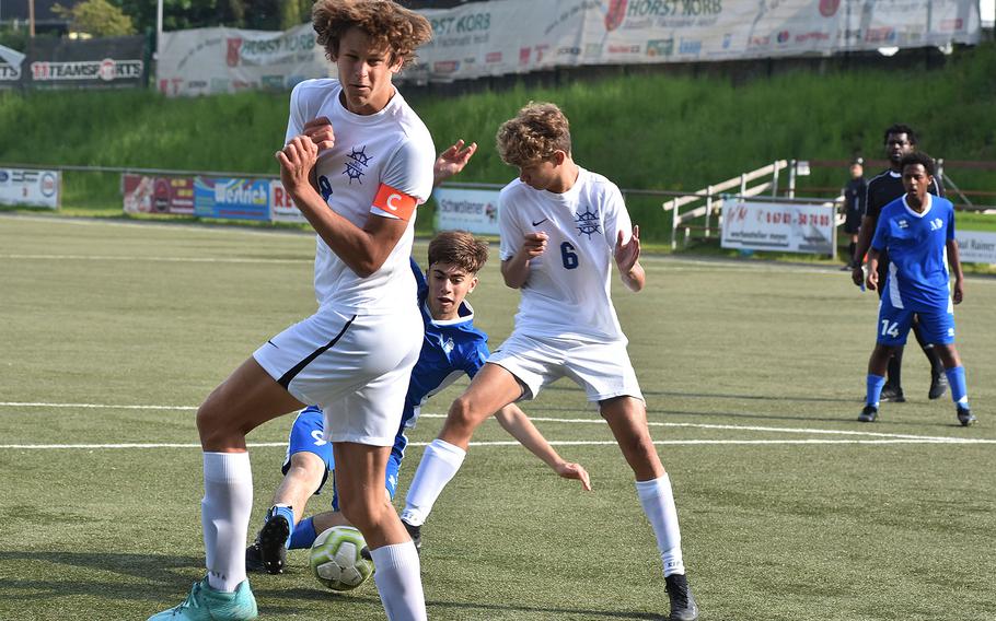 Rota's Tyler DeMeritt and Robert Jordan put their bodies between the goal and Marymount's Francesco Rizzitelli in the Royals' 1-0 victory on Monday, May 15, 2023, in the first round of the DODEA-Europe Division II soccer championships in Baumholder, Germany.
