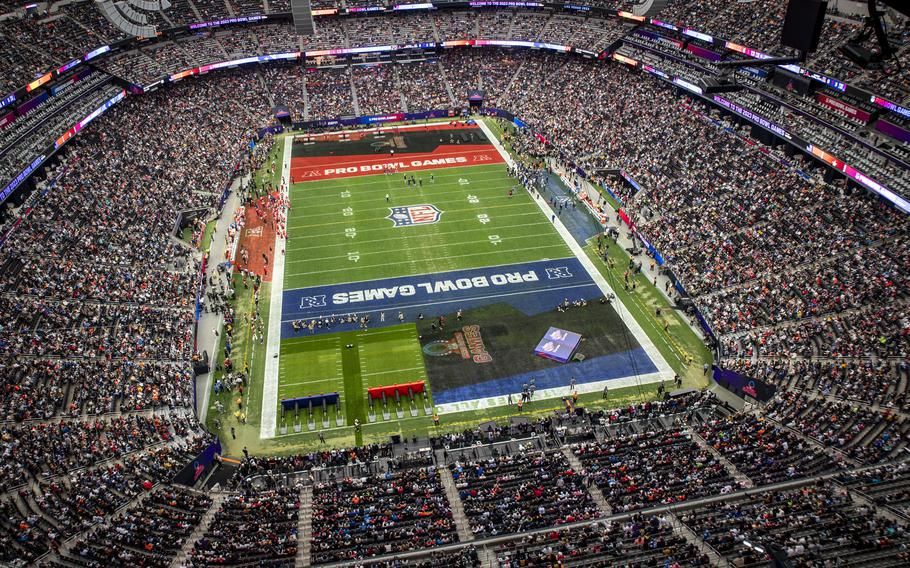 The 2023 NFL Pro Bowl at Allegiant Stadium in Las Vegas on Feb. 5 , 2023, viewed from a Navy F/A-18E Super Hornet. American Forces Network is airing full coverage of the NFL regular season and postseason via its television and mobile streaming services in Europe and the Pacific.