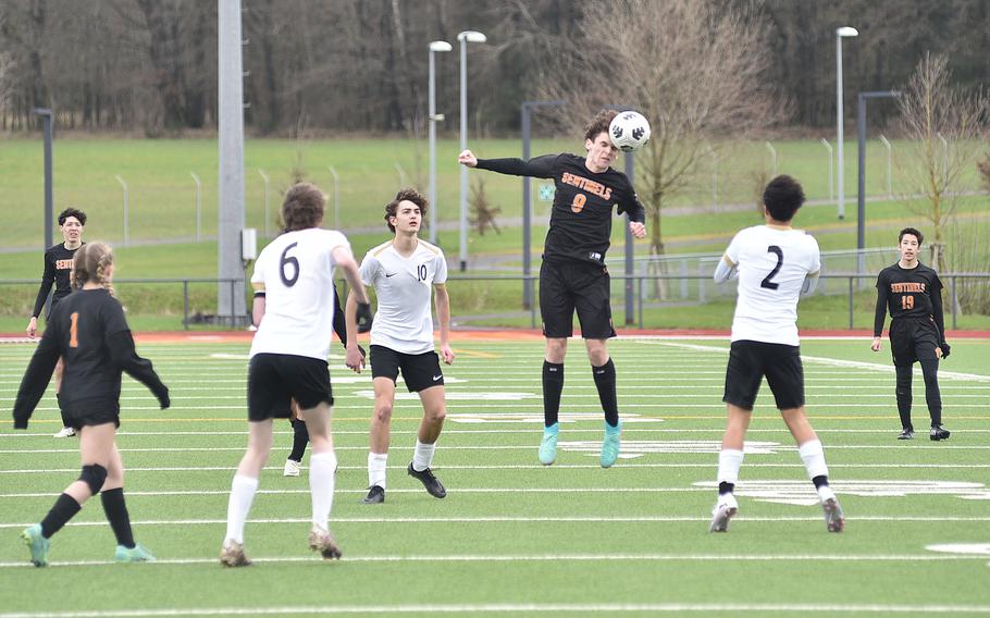 Sentinel midfielder Malachi Taherimorvat heads a ball during a March 16, 2024, game against Alconbury at Spangdahlem High School in Spangdahlem, Germany.