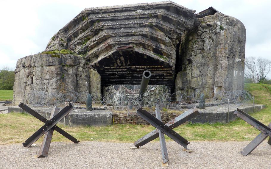 A German gun points toward Utah Beach at the Crisbeq Battery Museum, near Crisbeq, France. Here, visitors can walk through and around the German gun emplacements and bunkers.
