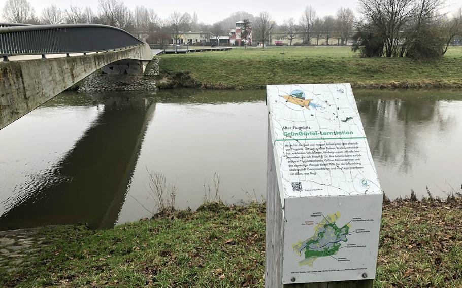 Informational signs teach children about the nature at Alter Flugplatz in Frankfurt. School groups visit the park as part of its "green classroom" initiative.