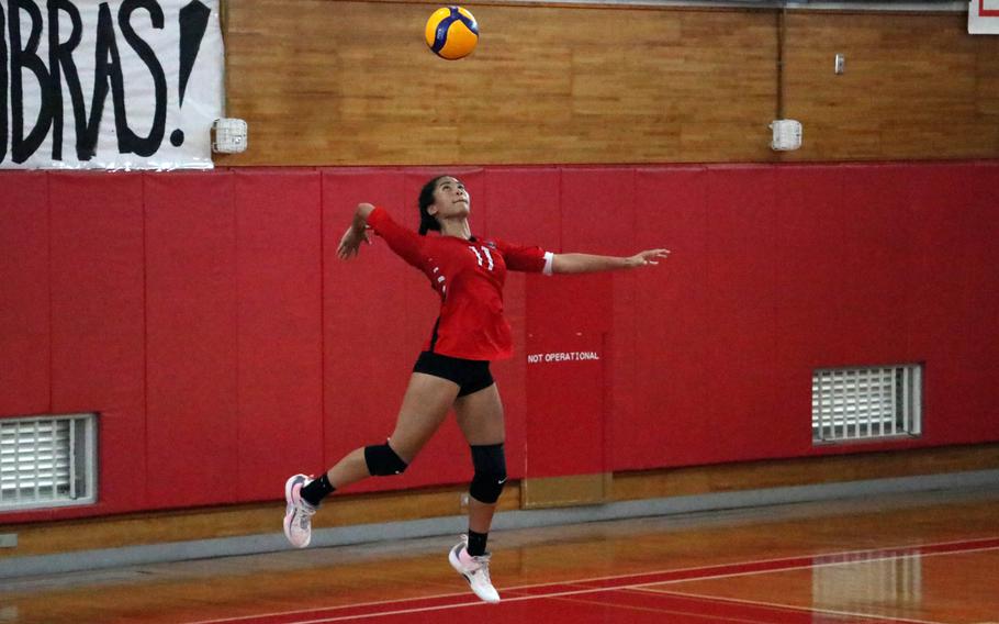 Aniah Little serves.