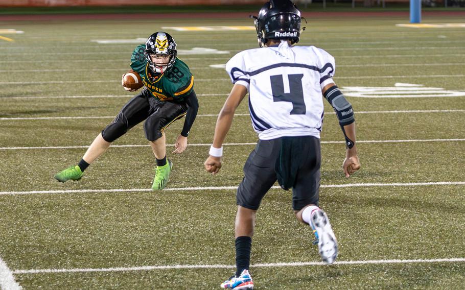 Robert D. Edgren receiver Roman Wells looks for operating room against Zama defender Ayden Helton.