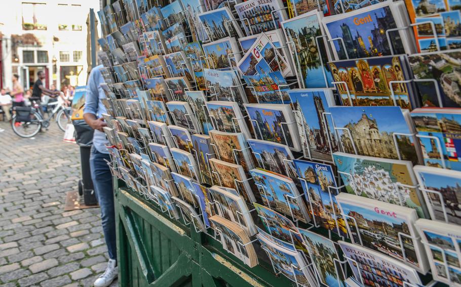 You can learn a lot about the culture of the place (Ghent, Belgium shown here) that you’re visiting during the process of buying and mailing a postcard.