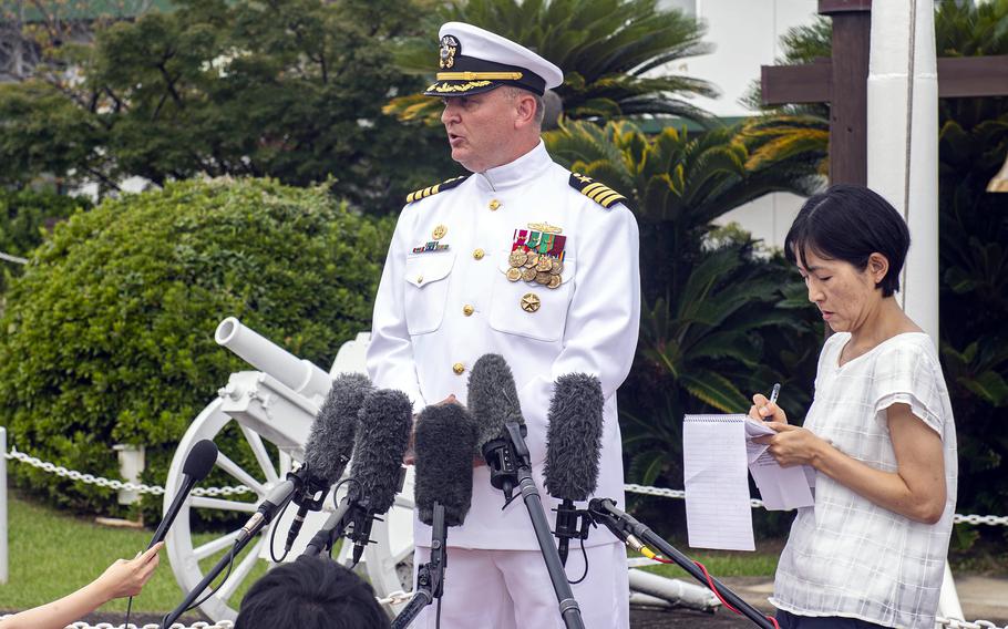 Capt. Michael Fontaine speaks to Japanese reporters after taking command of Sasebo Naval Base, Japan, Sept. 28, 2023.