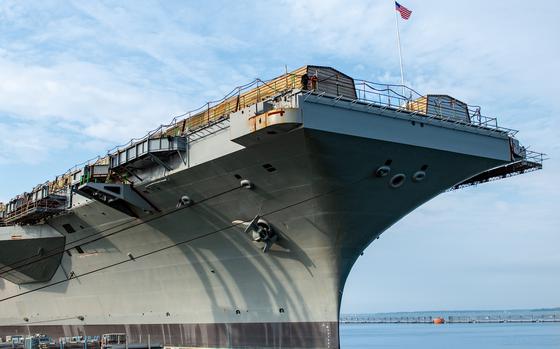 NEWPORT NEWS, Va. (July 19, 2024) The Nimitz-class aircraft carrier USS John C. Stennis (CVN 74) flies the national ensign in Newport News, Virginia, July 19, 2024. John C. Stennis is in Newport News Shipyard conducting Refueling and Complex Overhaul to prepare the ship for the second half of its 50-year service life. (U.S. Navy photo by Mass Communication Specialist 2nd Class Max Biesecker)