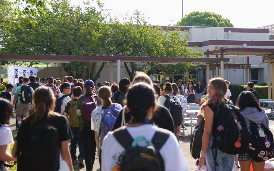 Students arrive for the first day of classes at Zama Middle High School at Camp Zama, Japan, Aug. 21, 2023.