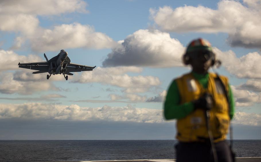 A plane comes in for landing on the USS Gerald R. Ford on Thursday, Oct. 6, 2022.