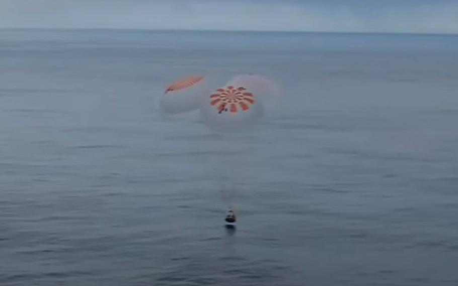 The SpaceX Crew Dragon Freedom carrying the four crew of the Axiom Space Ax-3 mission lands in the Atlantic off the coast of Daytona Beach, Fla., on Friday, Feb. 9, 2024. 