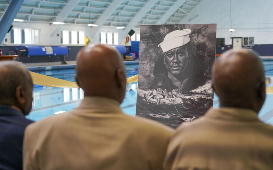Family members attend the Mess Attendant 1st Class Charles Jackson French pool dedication ceremony at the surface rescue swimmer training pool at Naval Aviation Schools Command Swim Site at Naval Base San Diego, May 21, 2022. 