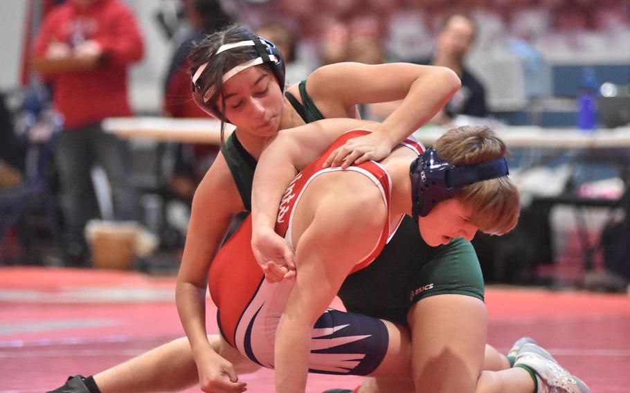 Naples' Jayden Furniss executes a reversal on Aviano's Christian Mack at 150 pounds, but Mack came back to win by pin Saturday, Jan. 14, 2023, at Aviano, Italy.

Kent Harris/Stars and Stripes