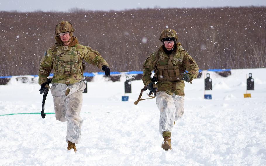 U.S. and Japanese soldiers train together during the North Wind exercise at Camp Higashi Chitose, Hokkaido, Friday, Jan. 26, 2024.