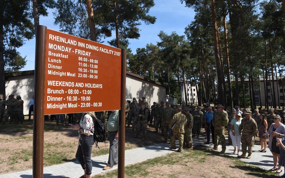 A crowd gathers outside the Rheinland Inn Dining Facility at Ramstein Air Base, Germany, on July 18, 2022. The dining hall reopened after more than two years following a major renovation project. 