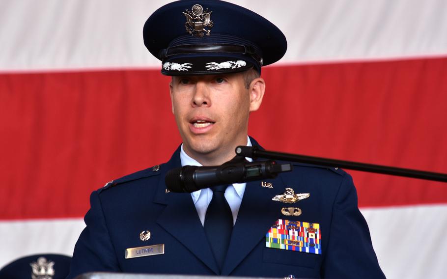 A man speaking at a podium.