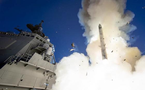 The Japanese destroyer JS Maya launches a missile during testing off Hawaii, Nov. 16, 2022.