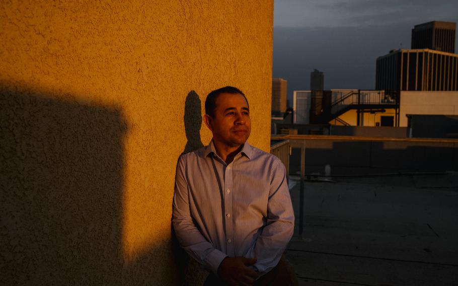 Jorge Nunez recently during the pandemic was laid off from his longtime job at the Cheateau Marmont. Here, Jorge poses for a portrait on the roof of his apartment complex where he lives on Tuesday January 18, 2022. 