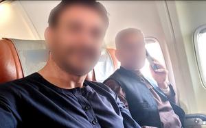 Mohammad, left, a Special Immigrant Visa applicant, takes a selfie on the flight that Task Force Argo, a private group set up and led by military veterans, chartered to evacuate him and other Afghans from Afghanistan in October 2021, weeks after the U.S. airlift out of Kabul had ended. Argo uses donations to house Afghan allies and U.S. citizens in safe houses while they wait for evacuation flights.