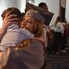 Marlee DaBrowski, an Army spouse, tearfully hugs her son, John, 4, after receiving her associate’s degree in general studies at the University of Maryland Global Campus Europe commencement ceremony on Saturday, April 27, 2024, at Ramstein Air Base, Germany. About 250 graduates walked the stage, out of a class of more than 1,100 who earned degrees from Europe, North Africa and the Middle East.
