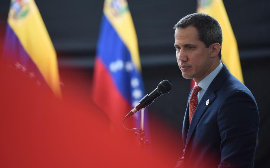 Juan Guaido, president of the National Assembly, who swore himself as the leader of Venezuela, speaks during a session of the National Assembly commemorating the sixty-fourth anniversary ending a military dictatorship, in Caracas, Venezuela, on Jan. 23, 2022. 