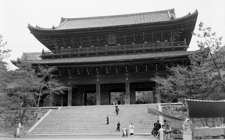 The Sanmon Gate at the Chion-in temple complex in Kyoto, as it was in March 1955. The 16th century gate measures over 78 feet and was photographed by Stars and Stripes photographer Neil E. Callahan. Callahan shot several street scenes and buildings in and around Kyoto. Seven of these negatives survived and were found in Stars and Stripes’ archives in 2024 and subsequently digitized.