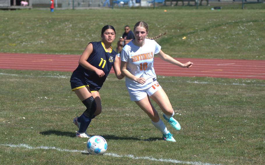 Kylie McVey drives around Marga Marzan.