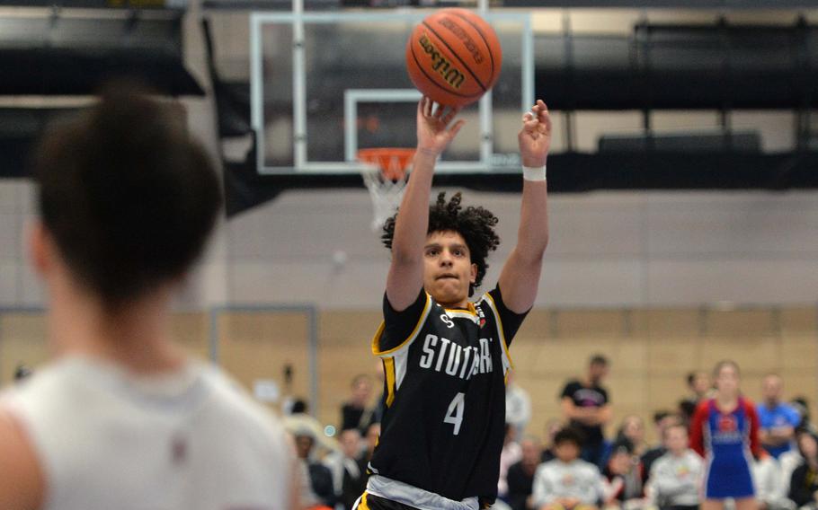 Stuttgart’s Ismael Anglada-Paz scores basket in the Division I championship game at the DODEA-Europe basketball championships in Ramstein, Germany, Feb. 18, 2023. Stuttgart took title with a 62-60 double overtime win.