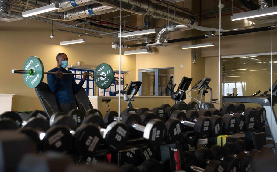 A sailor lifts weights in the multipurpose facility at Naval Support Facility Redzikowo, Poland, Jan. 11, 2022. NSF Redzikowo is the Navy's newest installation, with the mission of supporting Aegis Ashore missile defense system.